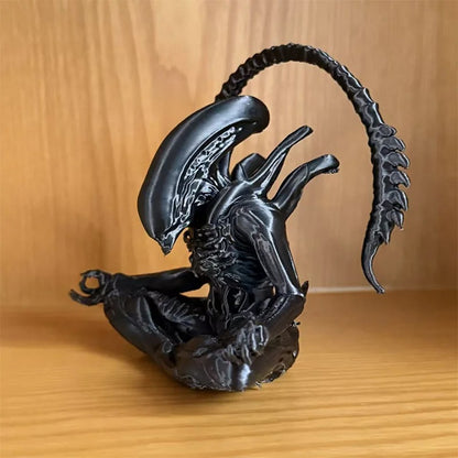 Alien Meditation Statue