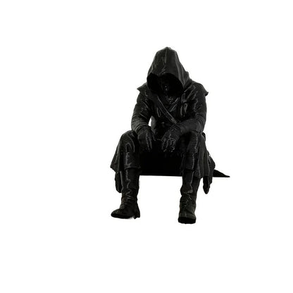 Mysterious Seated Figure Desk Ornament