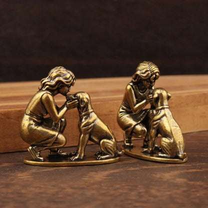 Two miniature lady and dog figurines shown from front and side angles