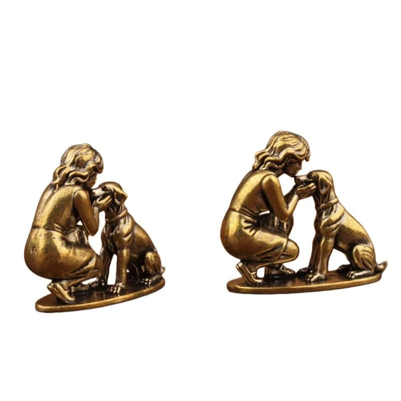 Two-piece miniature lady and dog figurine set in an antique brass-tone finish